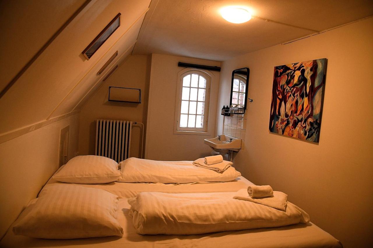 Small Gable Room (Double Bed) on 2nd floor. Shared Bathroom/Toilet
