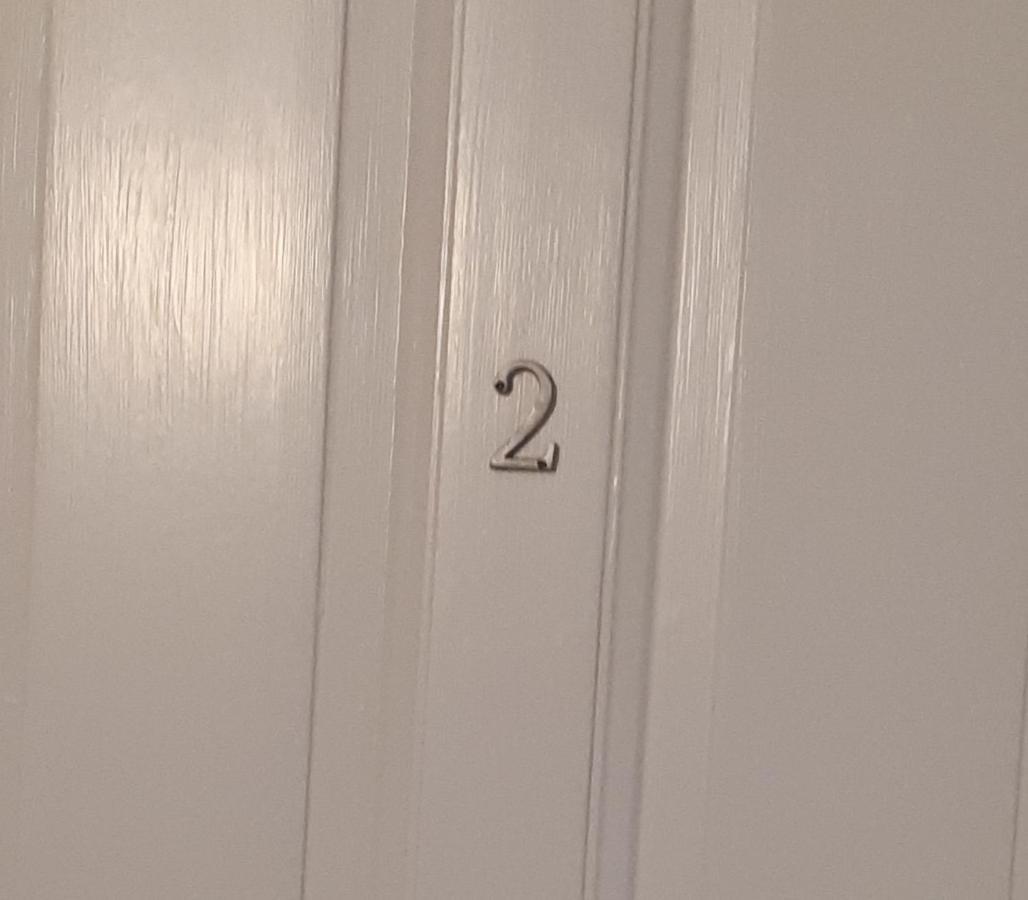 Fyrbäddsrum med delat badrum