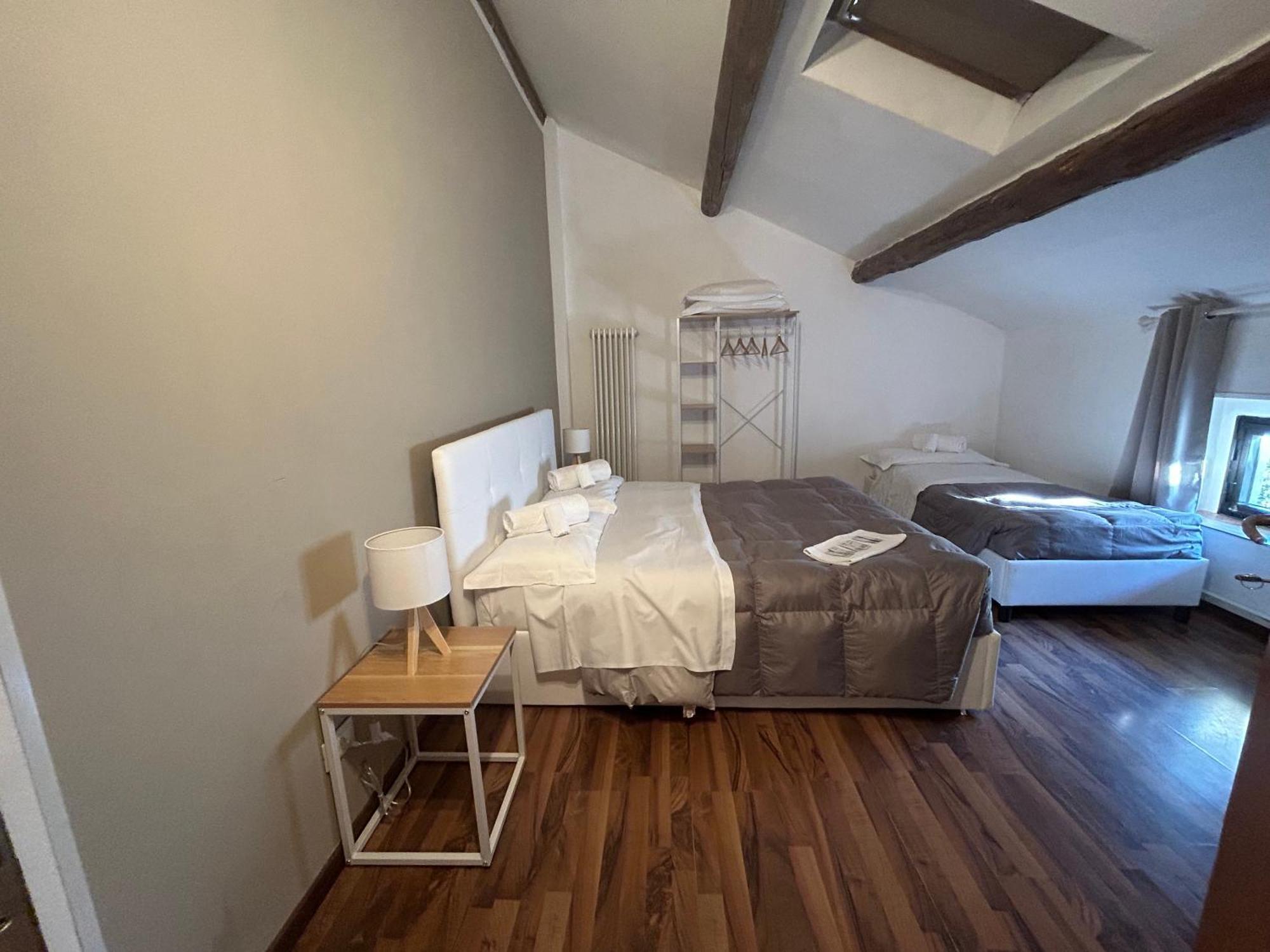 Camera Tripla Mansardata con Bagno in Comune