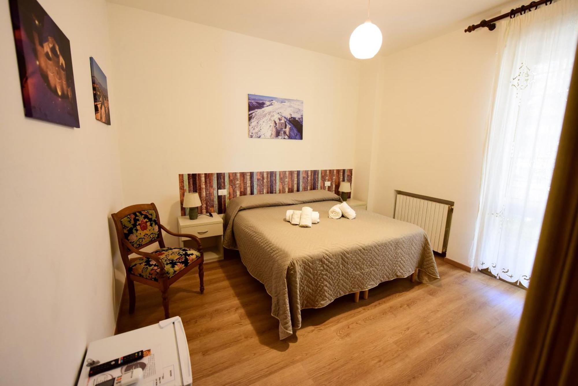 Camera Matrimoniale/Doppia con Letti Singoli con Bagno Privato