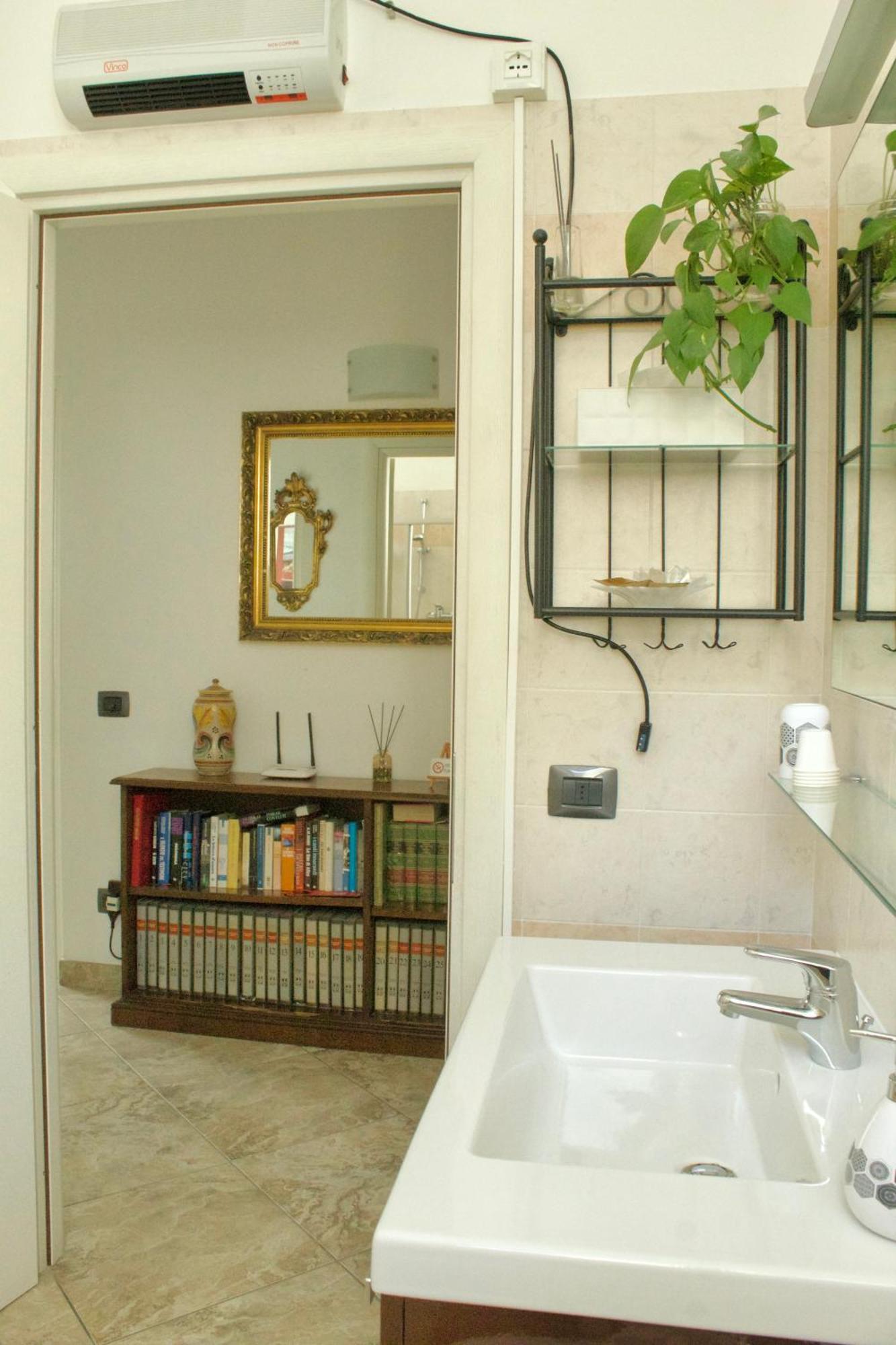 Camera Matrimoniale/Doppia con Letti Singoli con Bagno