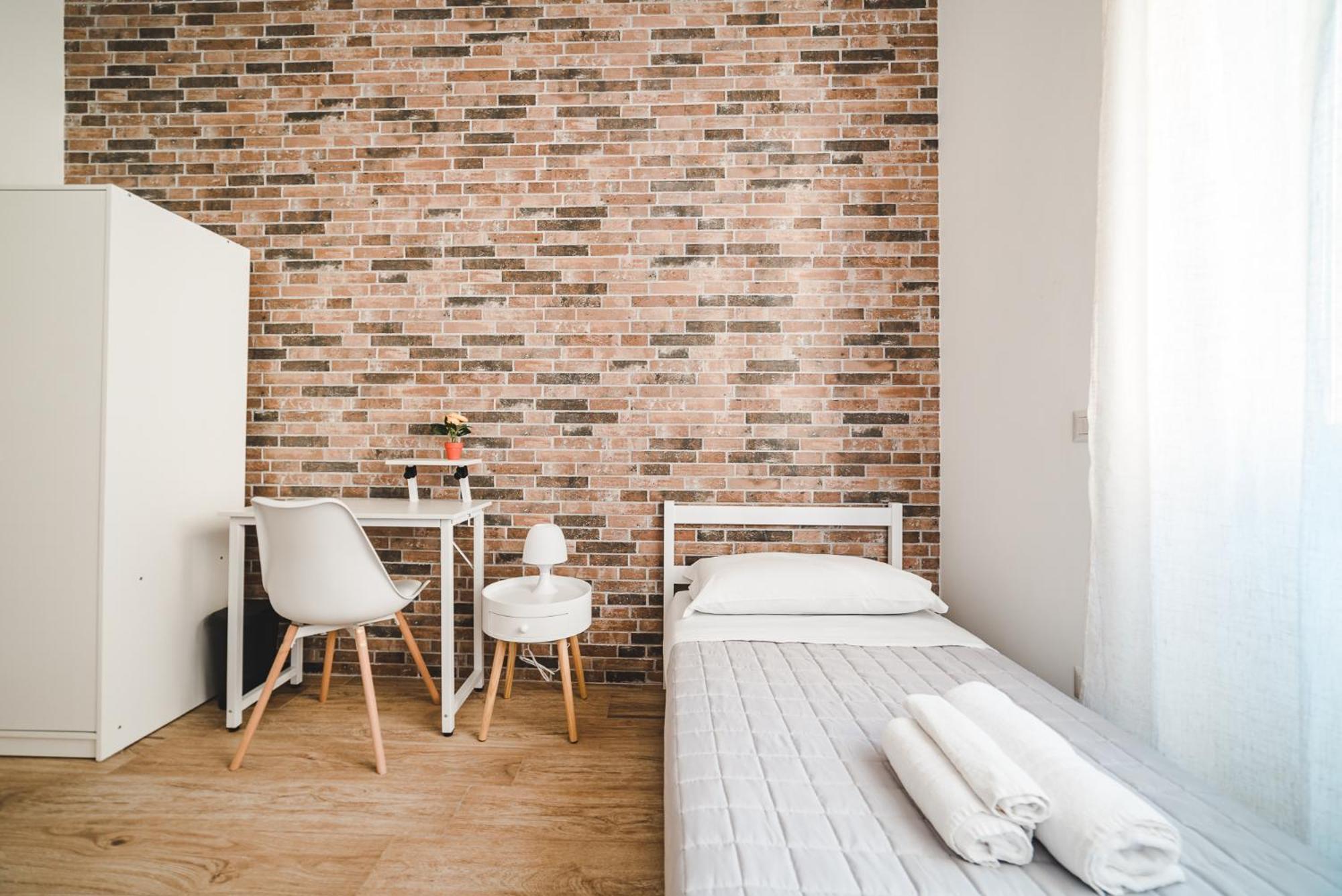 Camera Singola con Bagno in Comune