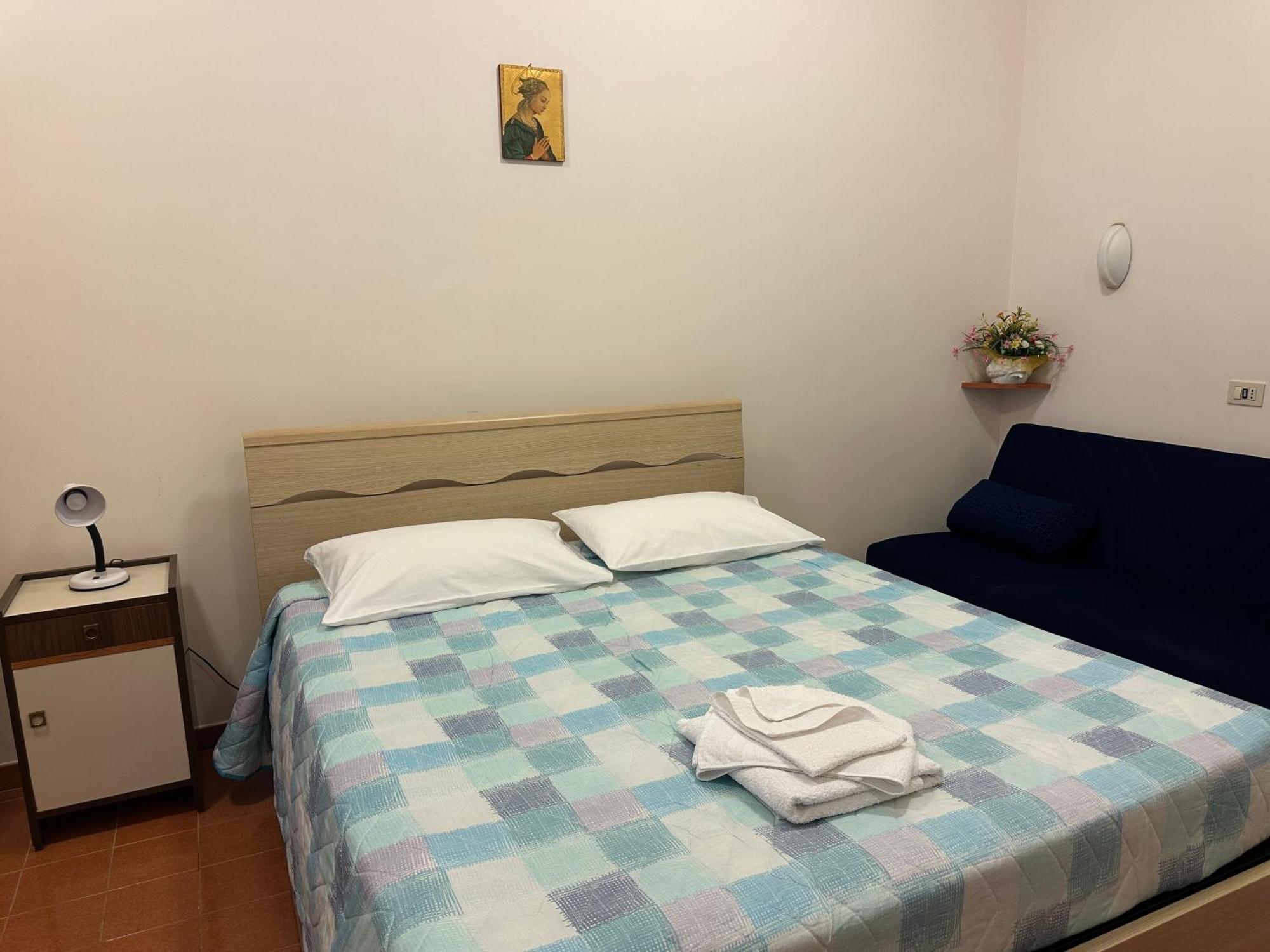 Quadruple Room with Private Bathroom