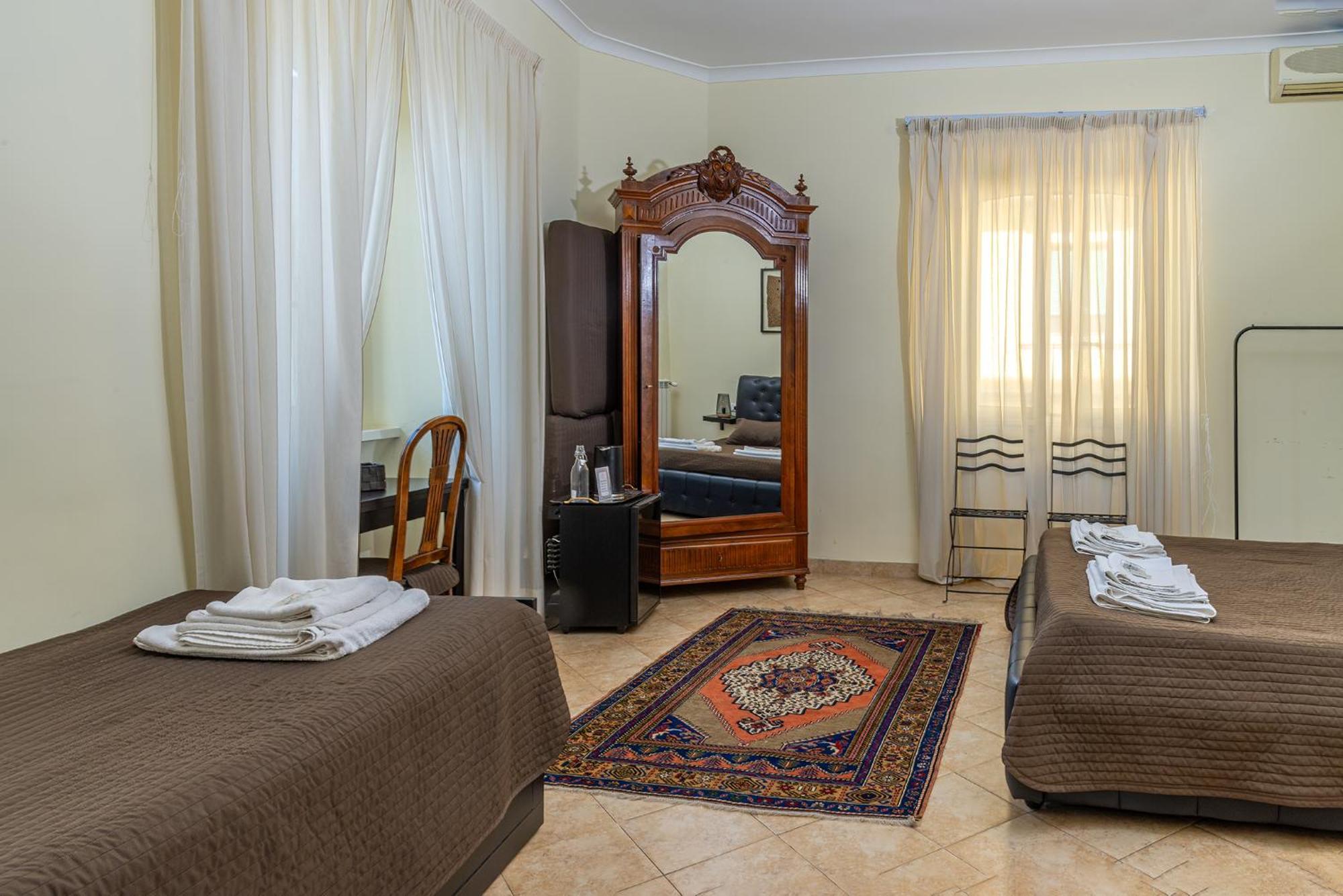 Quadruple Room with Private Bathroom