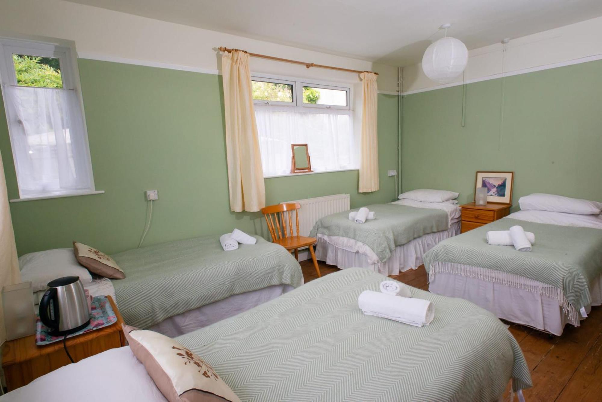 Quadruple Room with Shared Bathroom