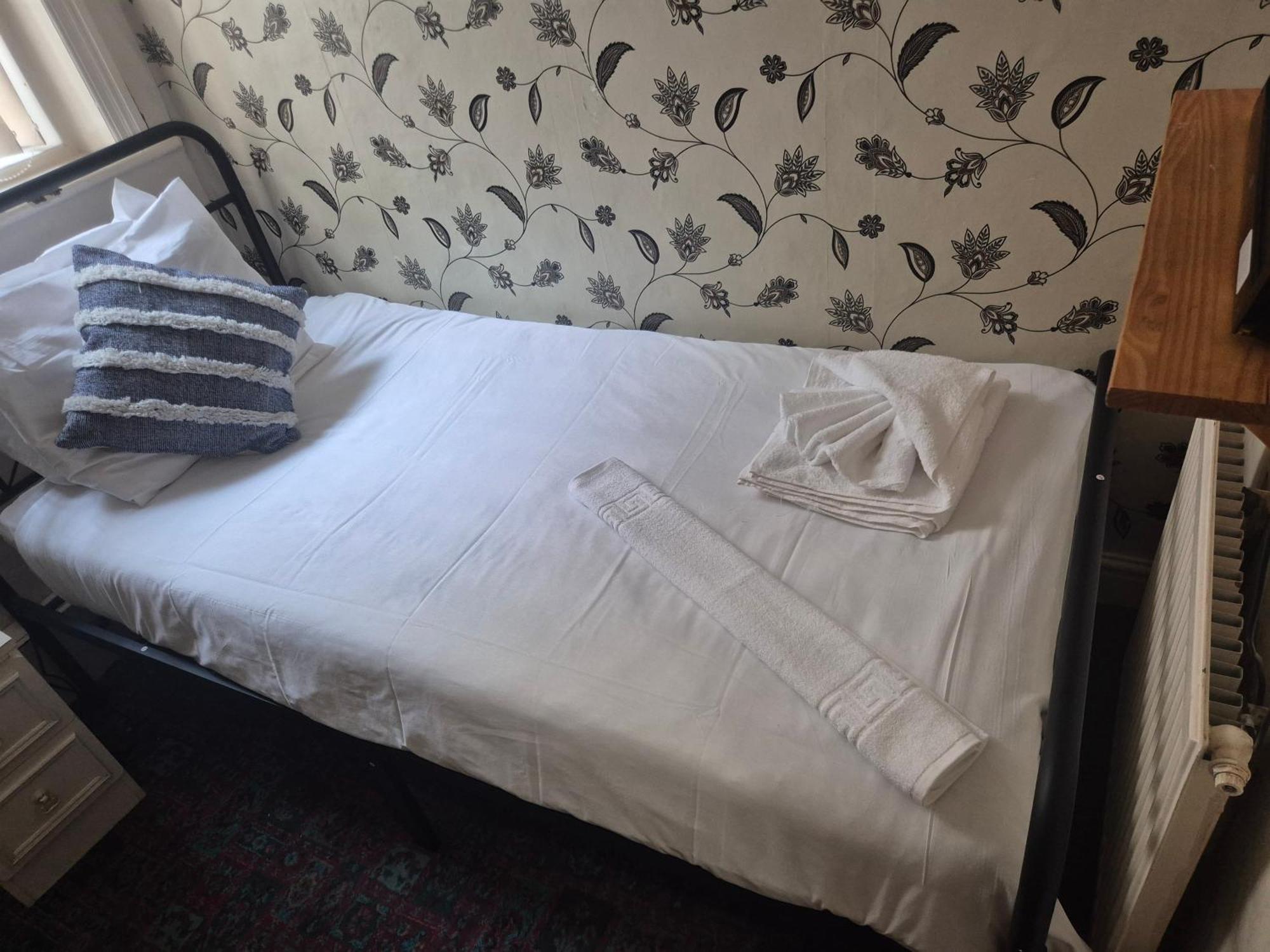 Single Room with Shared Bathroom