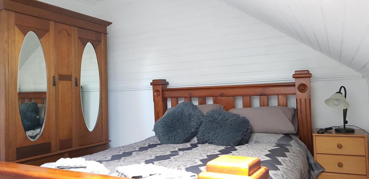 Queen Room with Shared Bathroom